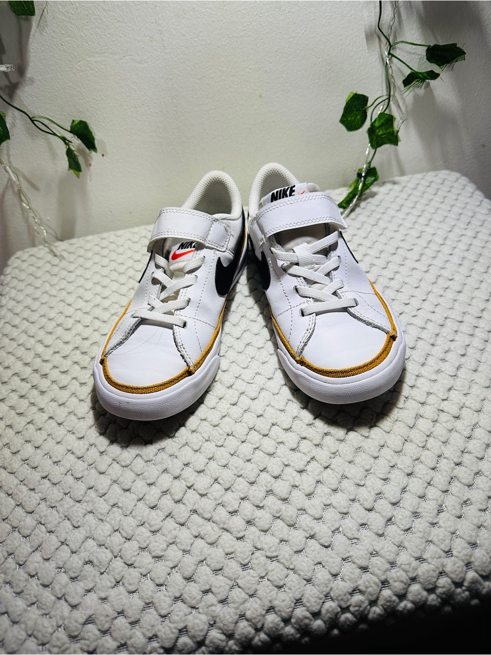 Nike Kids White Sneakers with Black Swoosh and Yellow Trim